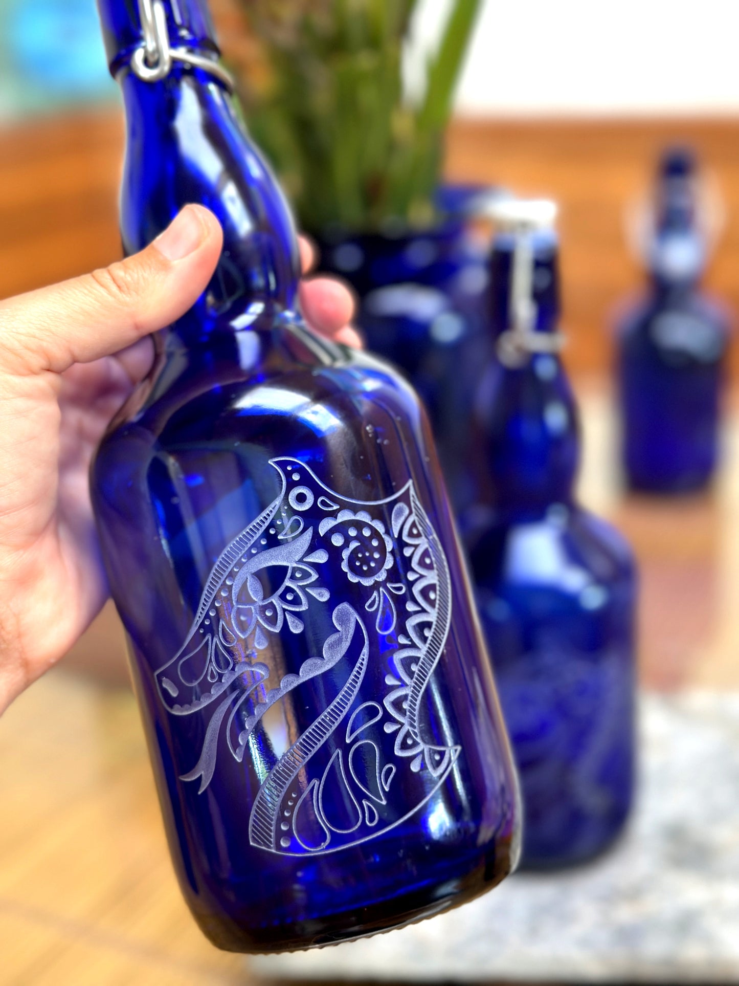 BLUE GLASS WATER BOTTLE WITH KAKAO DRAGON